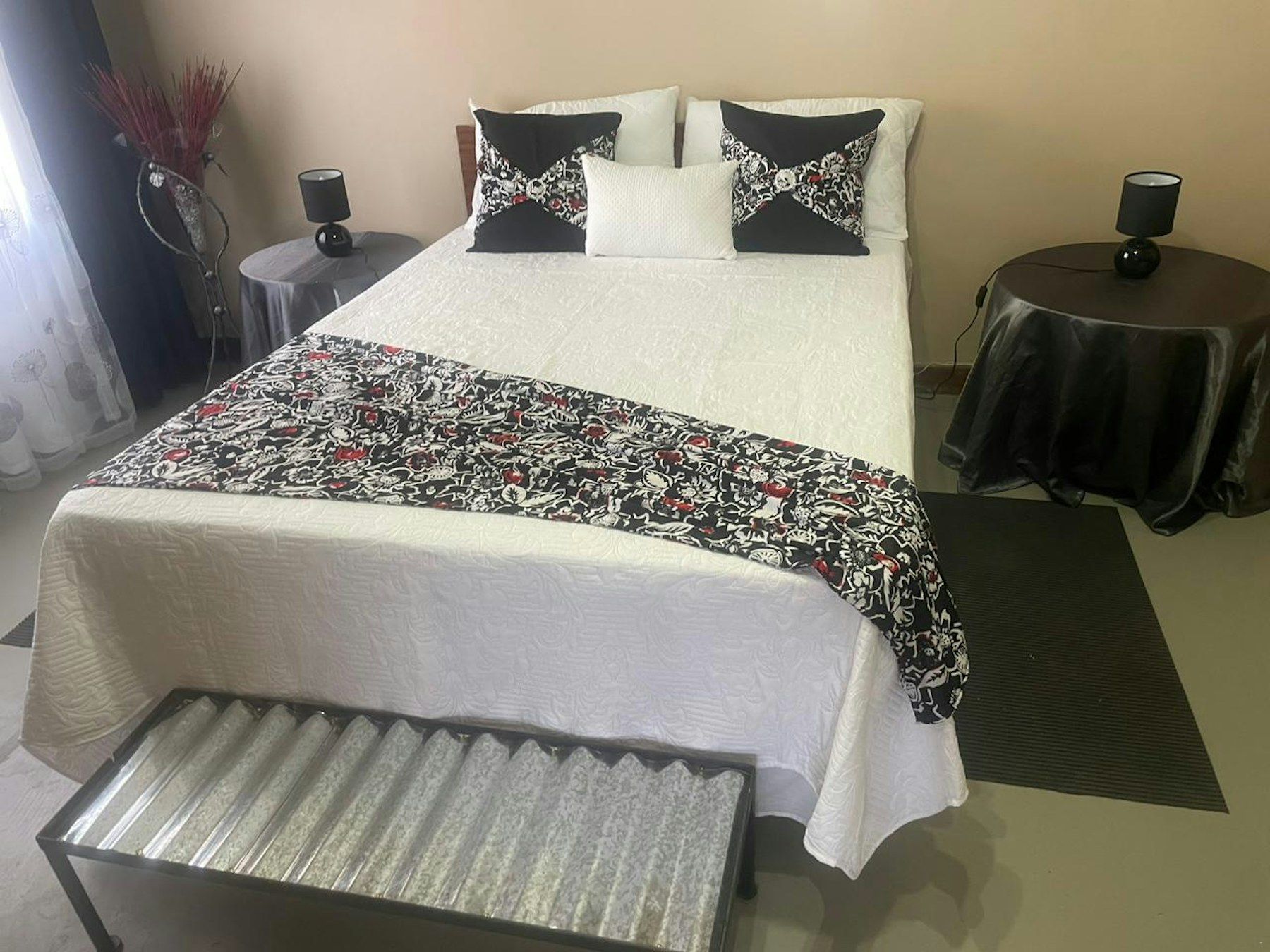 Double bed with black-and-white linen