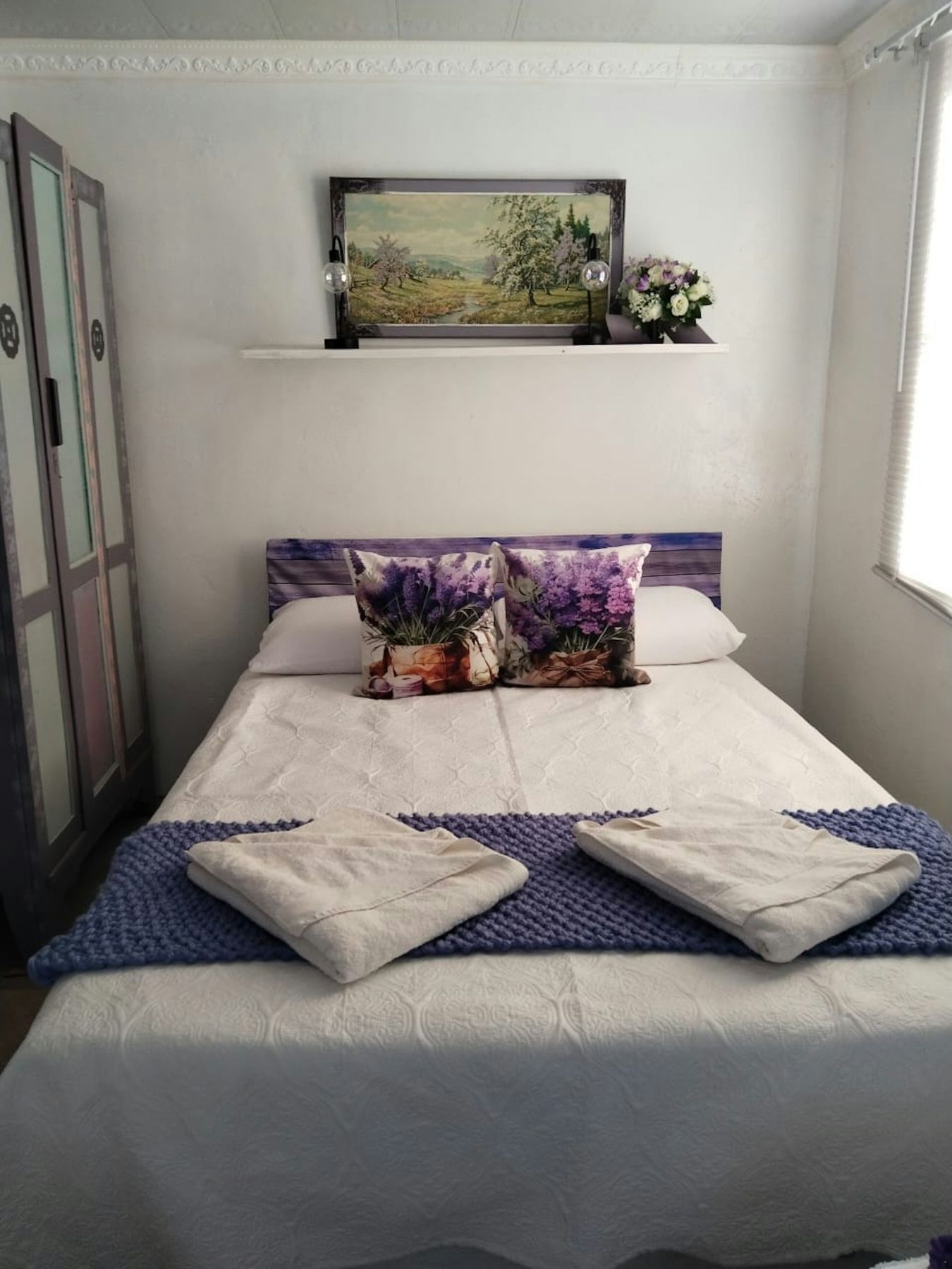 Double room with purple accents